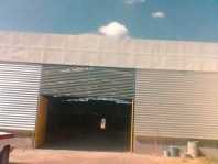 nave industrial, a pie de carretera. MAGNIFICA! en Tezoyuca, Mexico
